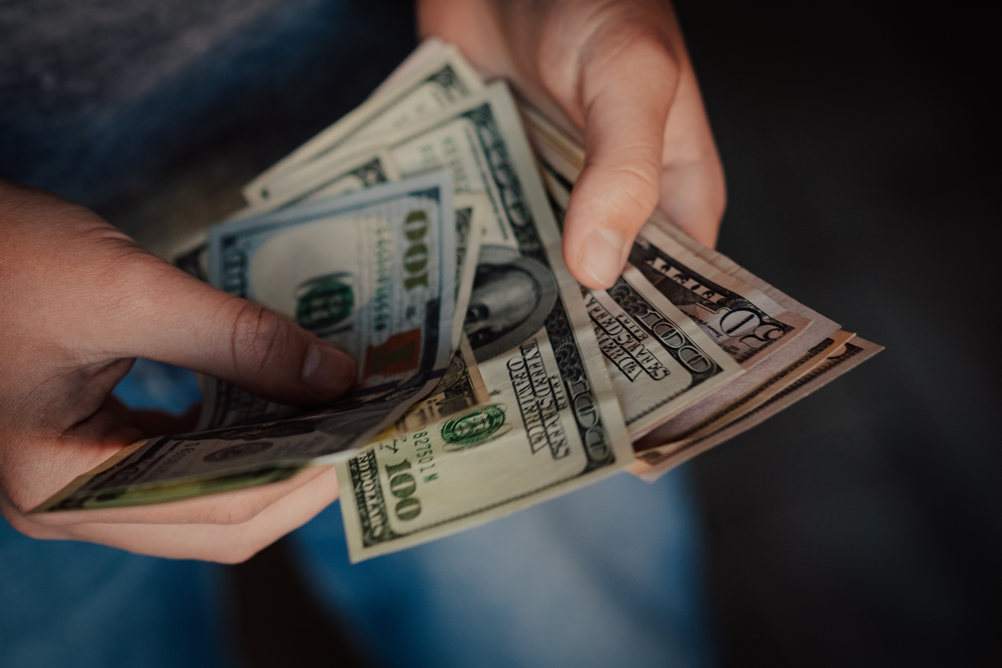 Hands holding money